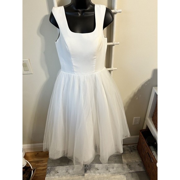Audrey Hepburn style Ivory tea length tulle wedding dress with cap sleeves - Picture 1 of 12